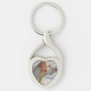 gult 4-labbet twisted heart silverfärgad nyckelring