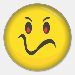 Gult ansikte som förargas runt klistermärke