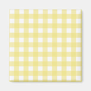 gult av blek och vit gingham magnet
