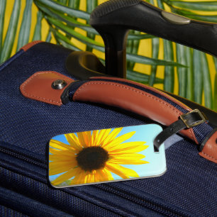 Gult blomma bagagebricka