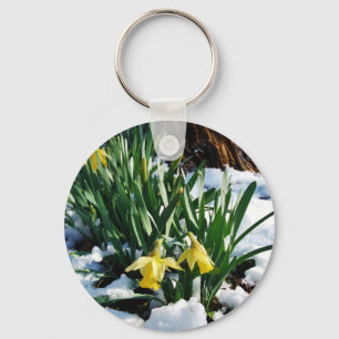 Gult Daffodils blommor i snö Nyckelring