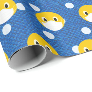 gult le ansikte med mask på polka dots presentpapper