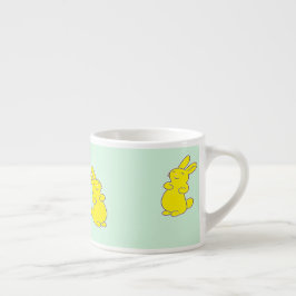 Gult lycklig bunnier på teal espressomugg