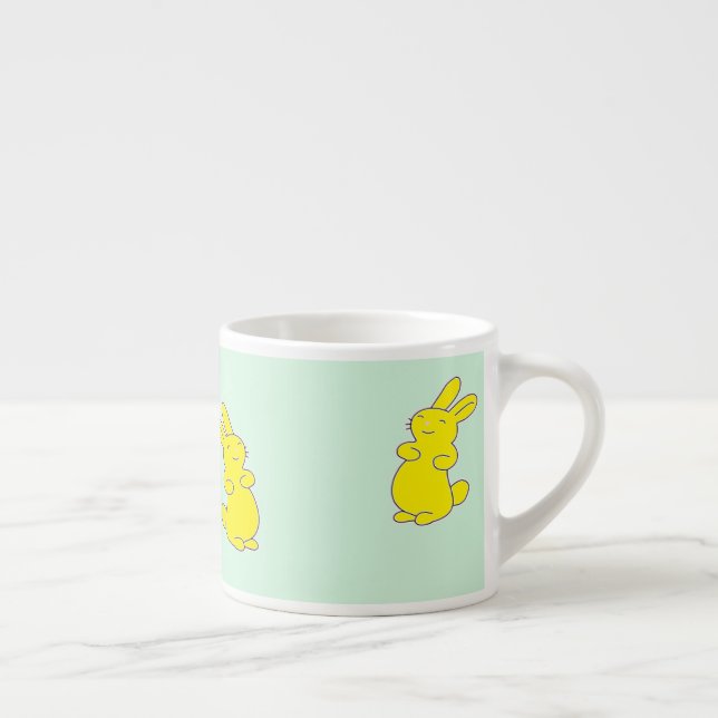 Gult lycklig bunnier på teal espressomugg (Höger)