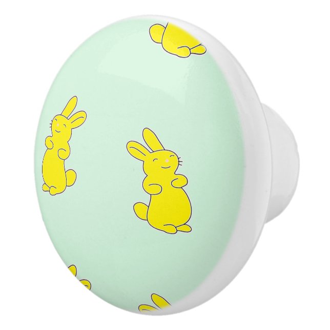 Gult lycklig bunnier på teal knopp (Höger)