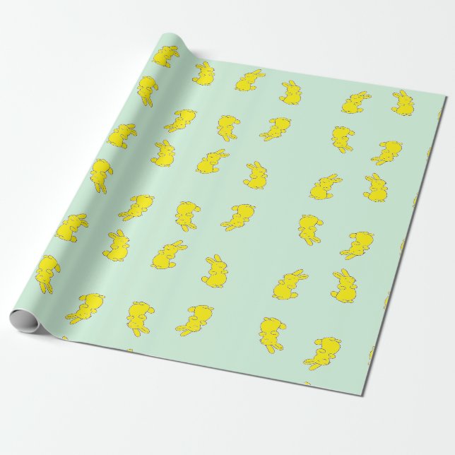 Gult lycklig bunnier på teal presentpapper (Utrullad)