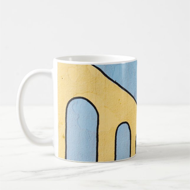 Gult och blåväggsskydd kaffemugg (Vänster)