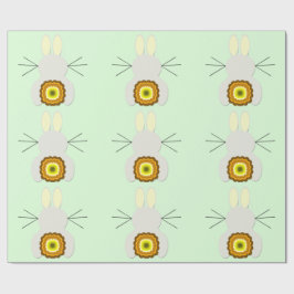 Gult Påskhare vid Papper radbrytning av Grönt Presentpapper