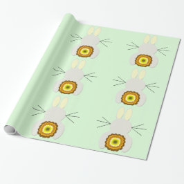 Gult Påskhare vid Papper radbrytning av Grönt Presentpapper