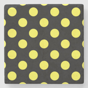 Gult polka dots på svart baksida stenunderlägg