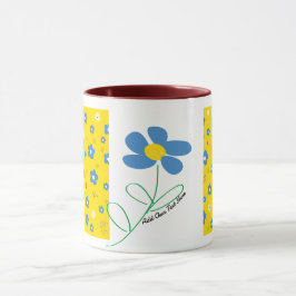 Gult, röd och blå blomma mugg