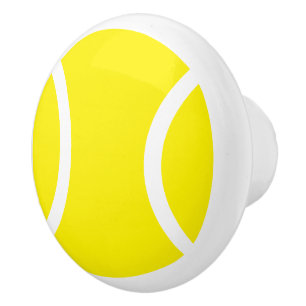 Gult tennis boll keramik dörr och facklingsknapp knopp
