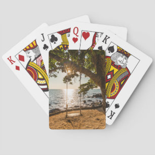 Gunga på stranden på solnedgången casinokort