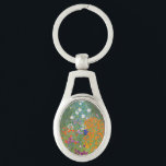 Gustav Klimt Blomsterträdgård Typ av skydd Ovalt Silverfärgad Nyckelring<br><div class="desc">En vacker trädgårdsmålning - det här är en klassisk målning av Gustav Klimt,  som heter Cottage Garden,  eller Bauergarten,  1907,  som är en nära blomsterträdgård,  en färgstark blommigt.</div>
