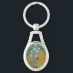 Gustav Klimt Blomsterträdgård Typ av skydd Ovalt Silverfärgad Nyckelring<br><div class="desc">En vacker trädgårdsmålning - det här är en klassisk målning av Gustav Klimt,  som heter Cottage Garden,  eller Bauergarten,  1907,  som är en nära blomsterträdgård,  en färgstark blommigt.</div>