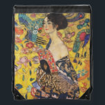 Gustav Klimt Dam med Fläkt Art nouveau-färg Gympapåse<br><div class="desc">Gustav Klimt Dam med Fläkt Art nouveau-målning Denna halva porträtt av en vacker kvinna har en gult med asiatiska ornament, färgstarka fåglar och blommor. Dam bär en klänning i stil på en kimono präglad av motiv för en kinesisk drakklänning. Vackra konstnärliga romantiska dekorativa bror konsmålning. Se mer av våra Gustav...</div>