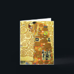 Gustav Klimt-fyllnadskort Kort<br><div class="desc">Gustav Klimt Fulfillment Note-kort. Frys från 1909. Fyllningen slutfördes under Klimts gyllene fas och fyller ett omfångsrikt par som håller varandra under en flermönstrad film med spiral, öga, fåglar, fisk och andra former. Bakgrunden till arbetet är samma brons spiral som skulle beröva konstnärens berömda Livets träd. En underbar gåva till...</div>
