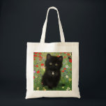 Gustav Klimt Kitten Tygkasse<br><div class="desc">Tote Bag med en Gustav Klimt-kattunge! Det svarta kattunge bär en silver och sitter i en fält av rött,  blått,  vitt och gula blommor. En underbar gåva till kattälskare och österrikiska konstentusiaster!</div>