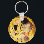 Gustav Klimt the Kiss Classic Painting Nyckelring<br><div class="desc">Gustav Klimt Kiss Gustav Klimt använde guld i sitt vackra arbete med kvinnor och dekorativa konst i art nouveau. Klimtmålningen kallades "The Kiss" och är det mest välkända art nouveau han någonsin målat upp. Gustav Klimt-målningen är av en kvinna och man i art nouveau i ett omfamnande. Färg är överväldigande...</div>