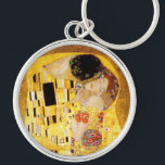 Gustav Klimt the Kiss Classic Painting Rund Silverfärgad Nyckelring<br><div class="desc">Gustav Klimt Kiss Gustav Klimt använde guld i sitt vackra arbete med kvinnor och dekorativa konst i art nouveau. Klimtmålningen kallades "The Kiss" och är det mest välkända art nouveau han någonsin målat upp. Gustav Klimt-målningen är av en kvinna och man i art nouveau i ett omfamnande. Färg är överväldigande...</div>