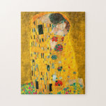 Gustav Klimt the Kiss Pussel<br><div class="desc">Pussel med Gustav Klimts oljemålning med guld löv Kiss (1908). En man och kvinna,  som bär briljant gyllene färg,  tar gärna till sig och kysser i ett fält av blommor. En underbar gåva till fläkt av Art nouveau och österrikisk konst.</div>