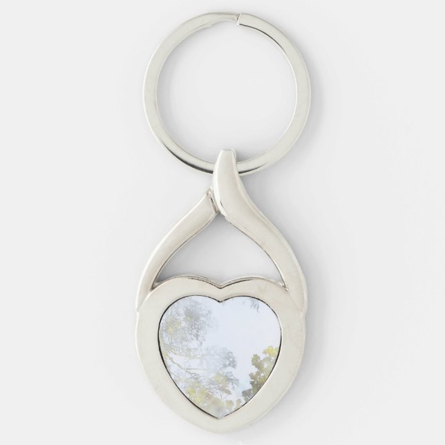 Gyllene bredbladsljus twisted heart silverfärgad nyckelring (Framsidan)