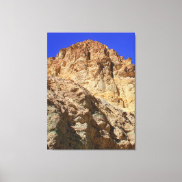 Gyllene ökenklippa under blå himmel canvastryck