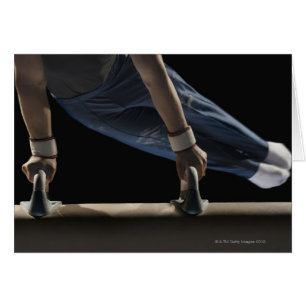 Gymnast swinging on pommel horse hälsningskort