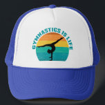 Gymnastik är Life Bevackra Sunset Gymnast Teal Keps<br><div class="desc">Gymnastiken är Life. Gastgåva i solnedgång med en vacker färgstark bakgrund bakom en kvinna som gör ett söt handställ med spalterna.</div>