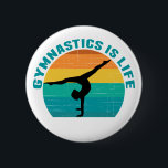 Gymnastik är Life Bevackra Sunset Gymnast Teal Knapp<br><div class="desc">Gymnastiken är Life. Gastgåva i solnedgång med en vacker färgstark bakgrund bakom en kvinna som gör ett söt handställ med spalterna.</div>