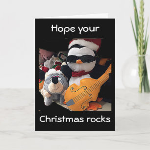 H0PE Y0UR JUL ’R0CKS’ SAYS GUITAR PLAYER HELGKORT