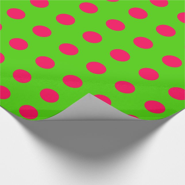 Ha rosa polka dots för rolig jul på grönt presentpapper (Hörn)
