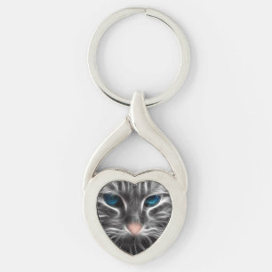 Häftig blåögd katt ansikte twisted heart silverfärgad nyckelring