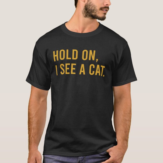 Håll i mig och se en katt. t shirt (Framsida)