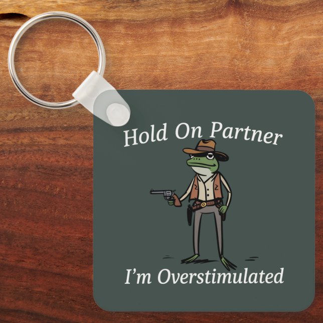 Håll Ut Partner Jag Är Överstimulerad Cowboy Groda Nyckelring (Framsida)