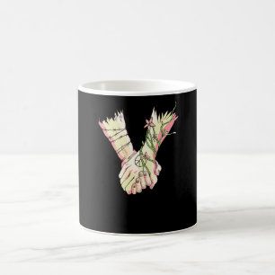 Hålla händer kaffemugg
