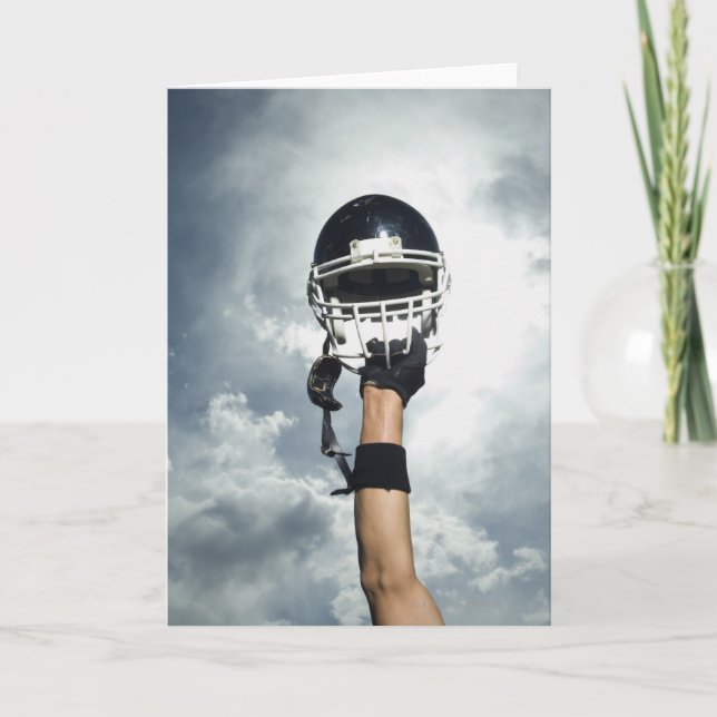 Hållande hjälm för fotbollsspelare i luft kort (Framsida)