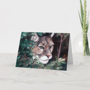 Hållande ögonen på tomt kort för puma