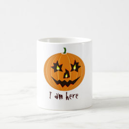 hallopolpumpa med ljus inuti kaffemugg