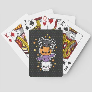 Halloween fester som leker kort spel kort