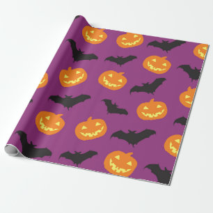 Halloween fladdermöss & sned pumpor på lilor presentpapper