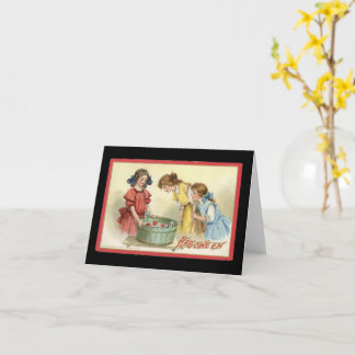 Halloween-flickor som hämtar äpplen Gammalt vykort