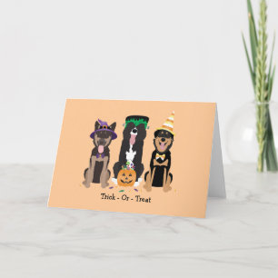 Halloween-hundar i Halloween-kostymer Kort