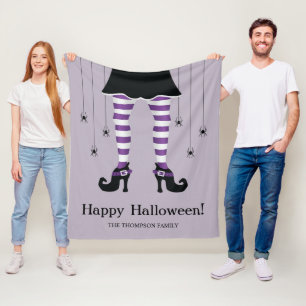 Halloween med lila randiga häxben och spindlar fleecefilt