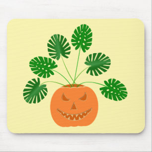 Halloween Monstera-växt i pumpa Musmatta