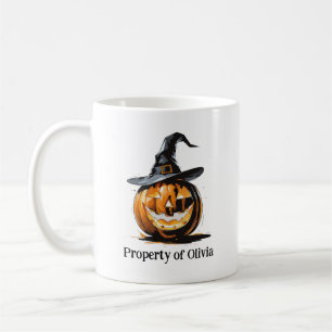 Halloween-pumpa som bär en häxhatt kaffemugg