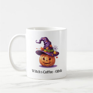 Halloween-pumpa som bär en häxhatt kaffemugg