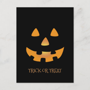 Halloween pumpkin ansikte på svart bakgrund vykort