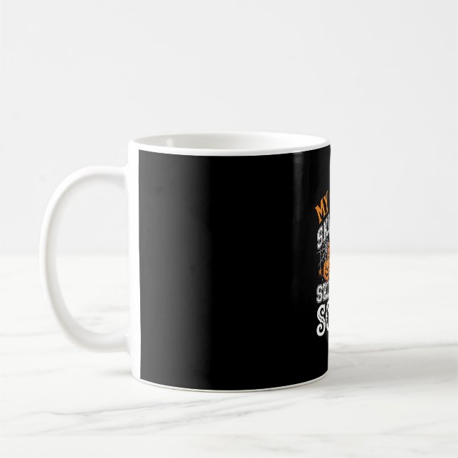 Halloween-spelkunskaper är en läskig spökliknande  kaffemugg (Vänster)