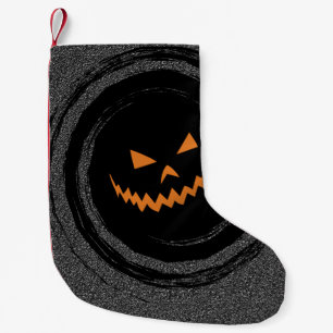 Halloween virvlar runt den glödande jacken liten julstrumpa